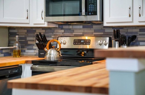 Lawrence House | Quiet, private, and fully remodeled. Minutes from KU and Mass