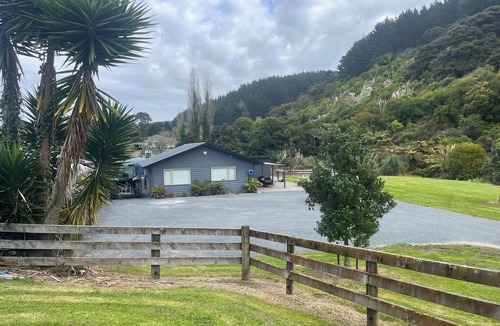 Kawhia House | Quiet private bush out look but right in town. Perfect for boaties