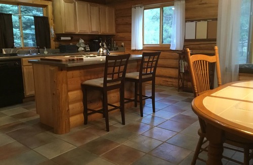 Libby House | Quintessential Riverfront Montana Log Home Experience