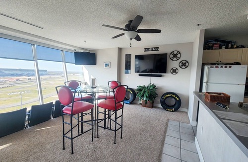 Denton County Condo | Race-Themed Luxury 7th Floor Texas Motor Speedway Condo - Right on the track!