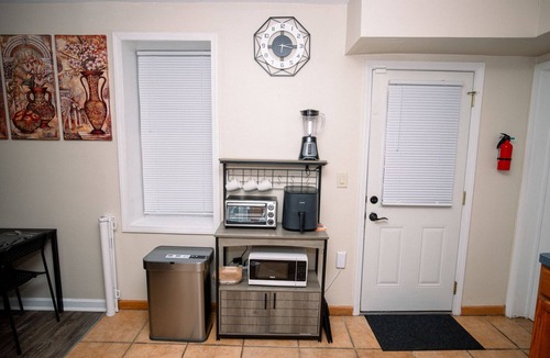 Garfield Heights House | Radiant Rockside Retreat, Fast internet, Self-check in, 3 bdrm, office, garage.