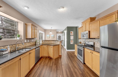 Baldwin Cottage | Rainbow Lake Luxury Beachfront Oasis with Hot Tub! - Hosted by Simple Lyfe Stays