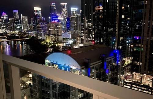 Rainey Street Historic District Apartment | Rainey street 31st floor lake view balcony, king bed, rooftop pool, gym, coffee