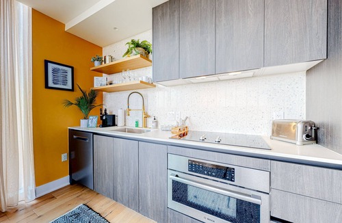 Rainey Street Historic District Condo | Rainey Street condo w/city-view balcony, rooftop pool & gym - Dogs OK
