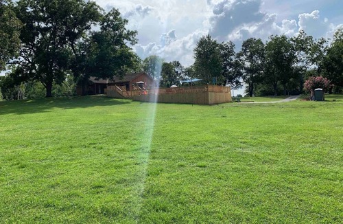 Gunter Afs House | Ranch-Style Oasis: Private CozyXscape with Pool & Fire Pits sleeps 10