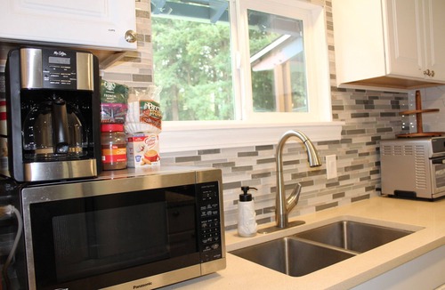 Federal Way House | Rare 1.5-acre gem—updated Home with Peaceful, private setting and serene.