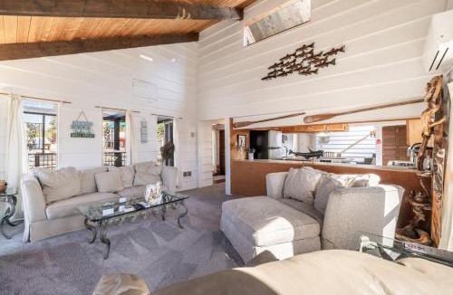 Bayview House | Rare Floating Home Retreat in Bayview With Dock