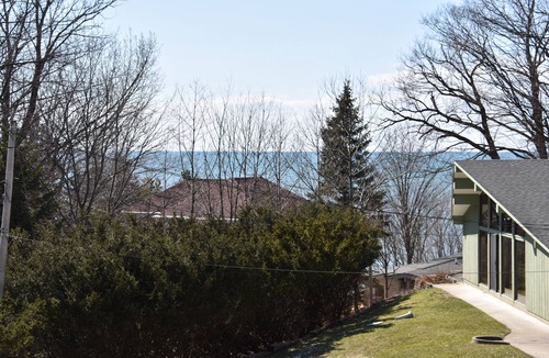 Macatawa Cottage | Rare Opportunity in Private Macatawa community