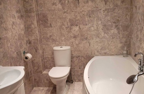 Sherborne St. John House | Reasonably large room with luxurious bathroom and a fitted kitchen