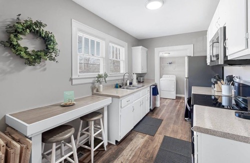 Lupton City House | Red Bud Summary: Red