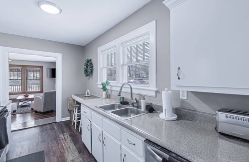 Lupton City House | Red Bud Summary: Red