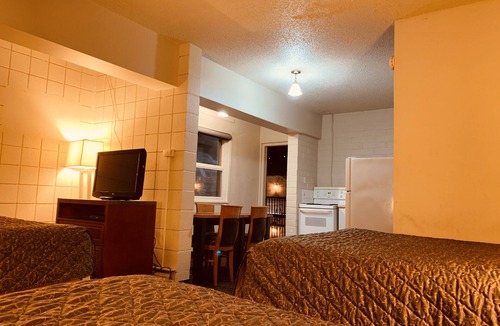 Montgomery Hotel | Red Carpet Inn & Suites Calgary