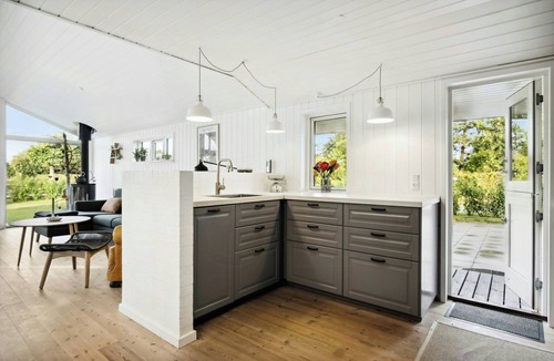 Vejlby Fed House | Red house by Fyn's coast awaits cosiness
