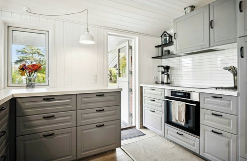 Vejlby Fed House | Red house by Fyn's coast awaits cosiness