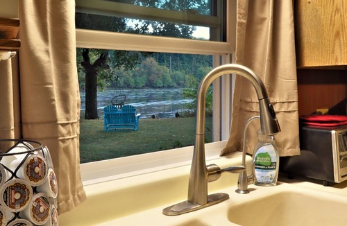 Wasco House | Red Riverfront Cottage w/Firepit & Swings, Blackhawk on the Fox!