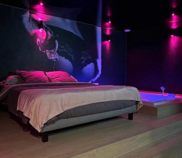 Pontarlier Apartment | Red Room by Loveroomeo