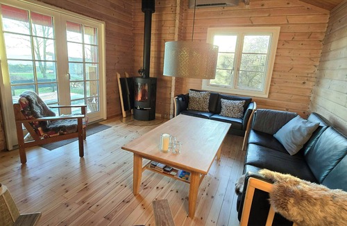 Vester Grønning House | Red timber house with fjord view