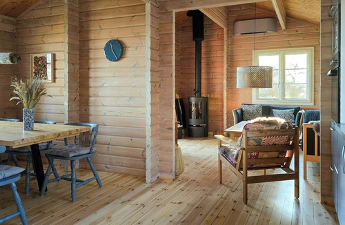 Vester Grønning House | Red timber house with fjord view