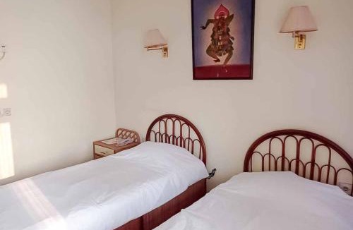 Anyer Hotel | RedDoorz Plus near Tugu Mercusuar Anyer