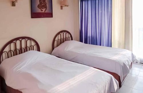 Anyer Hotel | RedDoorz Plus near Tugu Mercusuar Anyer