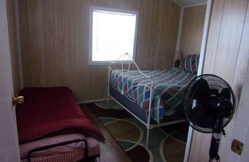 Hemphill Cabin | Reel Em In! Small, clean cabin set back from water on WF property w/boathouse