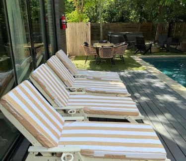 East Cesar Chavez House | Refined Rainey Retreat - Pool - Hot tub - Fire Pit