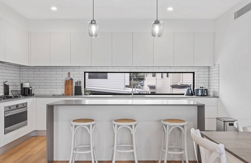 Speers Point House | Reflections on The Esplanade