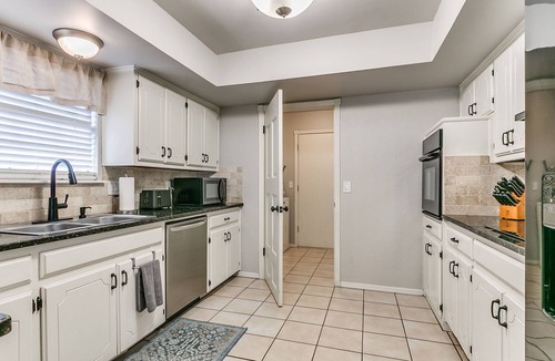 Edmond House | Refreshed Edmond Farmhouse King Suite and Fence
