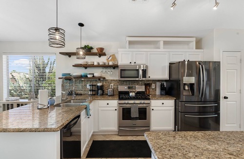 Springfield Lakes Reflection House | Refreshing Pool, backyard oasis, golf course views, fire pit, master suite
