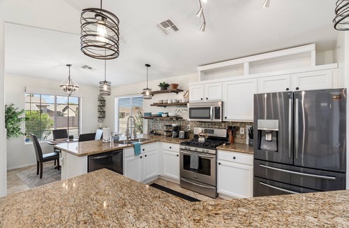 Springfield Lakes Reflection House | Refreshing Pool, backyard oasis, golf course views, fire pit, master suite