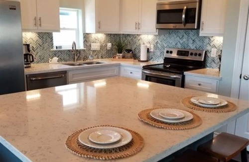 San Luis House | Relax and enjoy water views of the Gulf and beautiful home so near the beach!