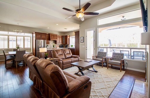 Mountain Park Ranch House | Relax and recharge at this stylish desert retreat with views of rolling desert hills. Enjoy sunsets from the heated pool, dine outdoors, or unwind with a few on the putting green. Perfect for long stays—just 15 minutes from the airport!