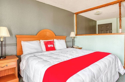 South Tulsa Hotel | Relax and Recharge in a Quiet Room w/King Bed + Handy Mini Fridge Setup