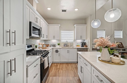 El Paso House | Relax and recharge in this stylish West El Paso home featuring a spacious king suite, dedicated workspace, and a private fenced backyard with BBQ grill and outdoor seating. Minutes from shopping, dining, and hiking trails, it’s the perfect stay!
