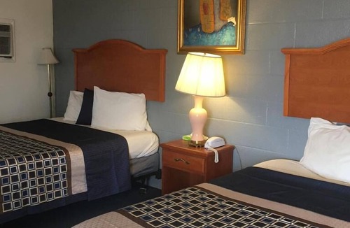 Fairview Hotel | Relax and Unwind at Knights Inn Fairview! 4 Comfortable Units, Pet-friendly