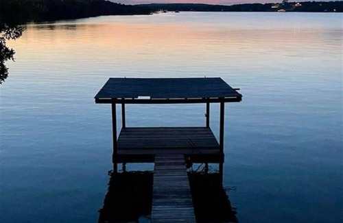 Bowie House | Relax at Cap's Cabin on Amon G Carter lake. 3/2 home w/hot tub, and boat dock
