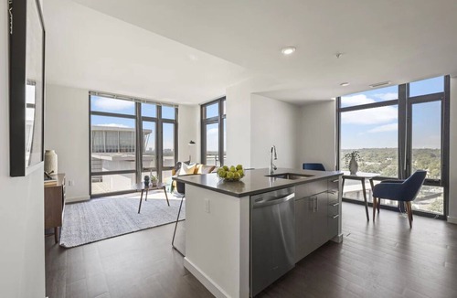 Bluemont Hotel | Relax at Spacious Apartment w/Full Kitchen & Rooftop Access | Landmarks Nearby
