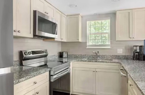 Sea Scape Resort | Relax in a 3-bedroom, 2-unit Beachwoods by Hilton resort in OBX Kitty Hawk, NC.