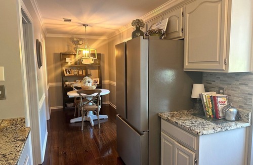 Augusta House | Relax in River Retreat: Masters or Iron Man