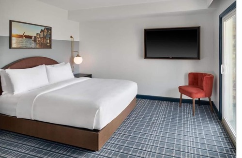 Canandaigua Hotel | Relax in Spacious Balcony Room Close to Adventure Spots + Pool & Hot Tub Access