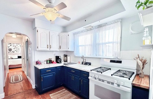 Southeast Yonkers Apartment | Relax in Style~Spacious 2BR w/Porch + Firepit~ Sleeps 7 ~ Free Wifi and Parking