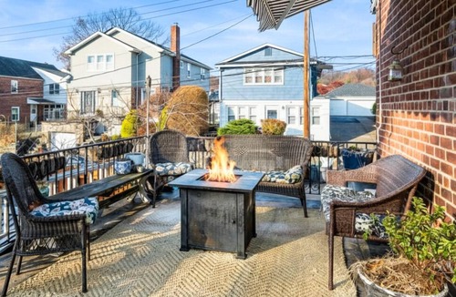 Southeast Yonkers Apartment | Relax in Style~Spacious 2BR w/Porch + Firepit~ Sleeps 7 ~ Free Wifi and Parking