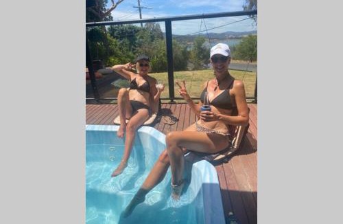 Goughs Bay House | Relax in the spa with views opposite Lake Eildon