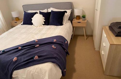 Goughs Bay House | Relax in the spa with views opposite Lake Eildon