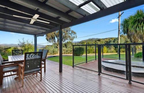 Goughs Bay House | Relax in the spa with views opposite Lake Eildon