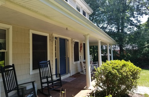 Saunderstown House | Relax on front rockers or private back yard/covered deck. Easy access Route 1A.