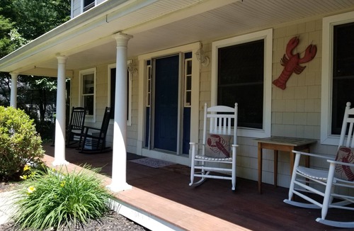 Saunderstown House | Relax on front rockers or private back yard/covered deck. Easy access Route 1A.