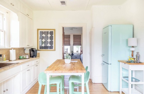 La Grange House | Relax on the Porch Swing | Walk to La Grange Square | Water Street Bungalow