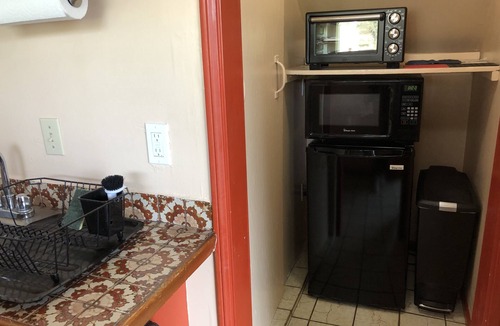 Hollywoodland House | Relax On The Spacious Deck and Enjoy The Hollywood Sign and Lush Canyon Views