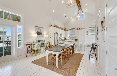 Cinnamon Shore House | Relax on Wrap-Around Deck at Cinnamon Shore Home w/Great Amenities